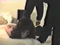 Masked black intruder having his way with this stunning brunette babe once she's in BDSM ties